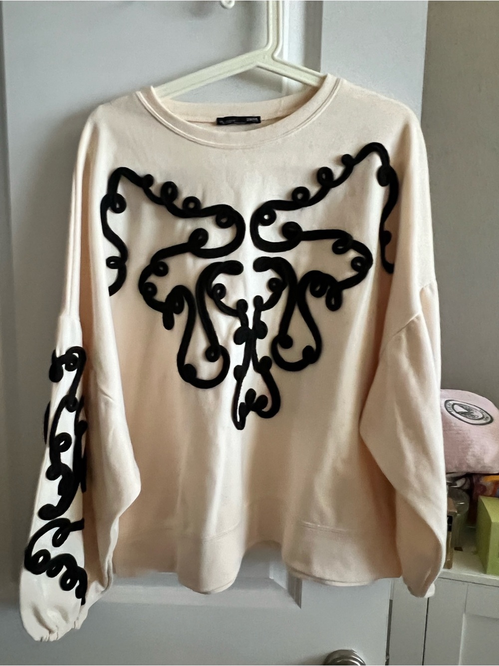 Zara Cream Sweatshirt with Black Appliquรฉ Swirl